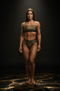 Women's black bikini set featuring metallic gold lion and mandala patterns with Titan Sport Global branded bands.