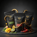Three black TITAN Sport Global smoothie pouches surrounded by fresh tropical fruits, berries, and gold liquid swirls.