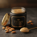 TITAN Almond Butter Classic Smooth Crown Edition — premium wide-mouth black glass jar product shot