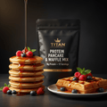 TITAN Protein Pancake & Waffle Mix — Matte black bag with gold crown, fluffy pancakes and waffle with maple syrup