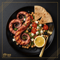TITAN Greek Grilled Octopus Chickpea Salad Lunch flat lay dark luxury