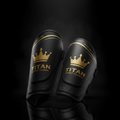 TITAN Soccer Shin Guards Crown Series — matte black with gold crown logo