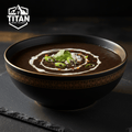 TITAN Organic High-Protein Black Bean Soup — Crown Edition matte black and gold bowl with TITAN SPORT GLOBAL logo
