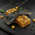 TITAN Passion Fruit Mango Protein Bar — Crown Edition matte black packaging