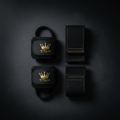 TITAN Wrist Wraps & Lifting Straps Set — Matte black with gold crown stitching flat lay