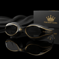 TITAN Swim Goggles Crown Edition — matte black with gold crown logo