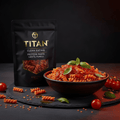 TITAN Clean Eating Protein Pasta Lentil Fusilli — rustic Italian plated dish with red lentil fusilli in tomato sauce, fresh basil and cherry tomatoes