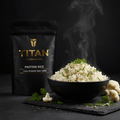 TITAN Clean Eating Protein Rice Cauliflower & Herb — steaming bowl shot with fluffy cauliflower rice, fresh herbs and olive oil drizzle
