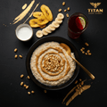 TITAN West African Peanut Butter Protein Oatmeal Breakfast flat lay dark luxury