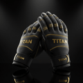 Black leather TITAN weight lifting gloves with gold stitching, accents, and logos on a reflective black background.