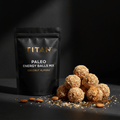 TITAN Paleo Energy Balls Mix Coconut Almond — bright scattered flat lay with coconut almond energy balls, whole almonds and toasted coconut flakes
