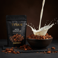 TITAN Keto Granola Dark Chocolate Almond — dramatic milk pour shot with dark chocolate almond granola, almond milk mid-splash and chocolate chunks