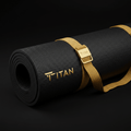 TITAN Premium Yoga Mat - Black with gold logo and carrying strap