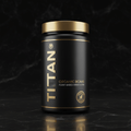 Black matte supplement tub with gold lid, "TITAN" logo, and "Organic BCAAs" text on a black marble surface.