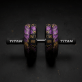 TITAN Ab Roller with dual wheels, black handles, and gold-purple phoenix designs labeled "CROWN EDITION" on a black base.