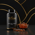 Black bottle of Titan Apple Cider Vinegar Detox capsules with gold accents and a bowl of amber gel capsules.