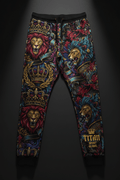 Black joggers with vibrant all-over print of lions, gold crowns, and ornate flourishes, featuring Titan Sport Global logo.