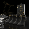 TITAN 6-pack low-cut black ankle socks with gold logo branding and textured detailing, displayed in packaging.