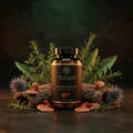 TITAN Antrodia Mushroom bottle with black label, liver icon, surrounded by mushrooms, bark, and herbs on dark ground.