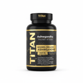 Black bottle of TITAN Ashwagandha capsules with a matte black label, gold leaf accents, and bold gold text.