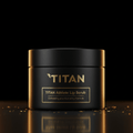 Black jar of TITAN Athlete Lip Scrub with gold logo and text, set against a dark background with gold specks.