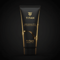 Matte black squeeze tube with gold lettering, logo, and a glossy, flowing gold wave design against a dark background.