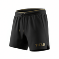 Black TITAN mesh training shorts with gold waistband trim, matching gold-tipped drawstring, and gold logo detail.