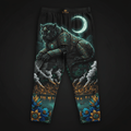 Black lounge pants featuring a glowing Aztec jaguar in teal armor atop a pyramid, moonlit city, and floral cuffs.
