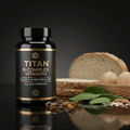 TITAN B-Complex vitamin bottle in black and gold with golden capsules, bread, eggs, and spinach on a black surface.
