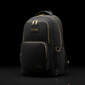 Black TITAN backpack featuring gold-toned zippers, hardware, and embossed TITAN logo patches against a black background.