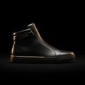 TITAN Blackout Elite high-top sneaker in matte black leather with gold logo, accent stripe, and a black textured sole.