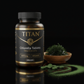 TITAN Chlorella supplement bottle with black and gold label, wooden bowl of chlorella, and green tablets on reflection.