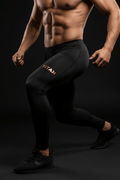Black compression pants with gold TITAN branding on the thigh, worn by a muscular athlete in a lunge position.