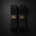 Black cotton lifting straps with gold "TITAN SPORT GLOBAL CROWN EDITION" branding on a sleek black background.