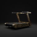 TITAN Crown Edition manual curved treadmill in black with intricate gold lion, crown, and baroque scroll patterns.