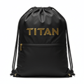 Black TITAN drawstring bag with gold logo, front zip pocket, gold hardware, and black rope straps.