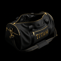 Black TITAN duffel bag with gold metallic logo, zippers, and hardware. Includes shoulder strap and side pockets.