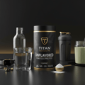 TITAN Unflavored Electrolyte Mix canister in black and gold with a golden scoop of white powder on a dark table.