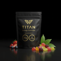 Black pouch of Titan Energy Gummies with gold branding, 100mg caffeine, B vitamins, and fresh fruit accents.