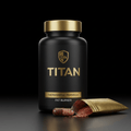 Black matte bottle of TITAN 24k Fat Burner with gold cap and label, next to a capsule and a gold foil pouch of beads.