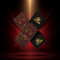 Titan 18" wrist wraps with gold and crimson tribal lion art and embroidered gold crown TITAN logos on black fabric.