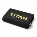Black microfiber gym towel with gold embroidered "TITAN" logo and water droplets, featuring a side branding tag.