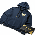 Men's navy blue performance hoodie featuring a gold Titan logo, black drawstring with gold tips, and branded gift box.