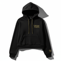 Black cropped pullover hoodie with gold TITAN chest logo, matching gold-flecked drawstrings, and cuff logo detail.
