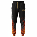 Black joggers with gold drawstrings, Titan Sport Global logo, and a vibrant red-orange flame and smoke print.