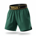 Boys' green athletic shorts with a black elastic waistband featuring gold "TITAN" text and lightning bolt branding.