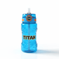 Blue 16oz TITAN kids water bottle with straw, orange accents, and embossed sea-themed graphics on a clear body.