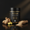 Black jar of Titan Maca Root Powder with gold text, raw maca roots, and a wooden scoop of beige powder on dark surface.