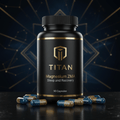 Black bottle of Titan Magnesium ZMA 90 capsules with gold logo on a dark reflective surface with scattered capsules.