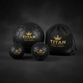 TITAN Sport Global 3-piece black massage ball set with gold logos and a matching drawstring carry bag.